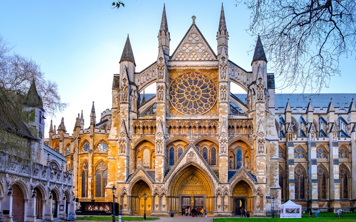 Northern entrance of Westminster Abbey with intricate Gothic architecture.