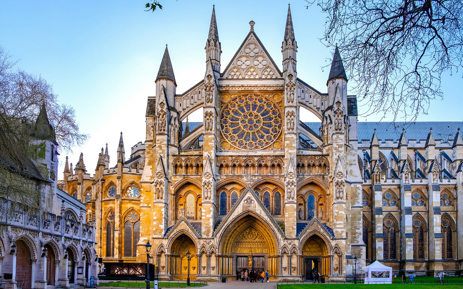 Northern entrance of Westminster Abbey with intricate Gothic architecture.