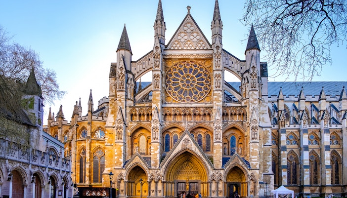 Northern entrance of Westminster Abbey with intricate Gothic architecture.