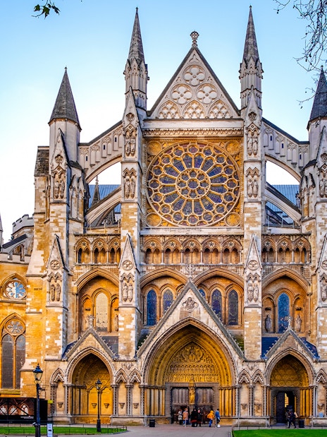 Northern entrance of Westminster Abbey with intricate Gothic architecture.