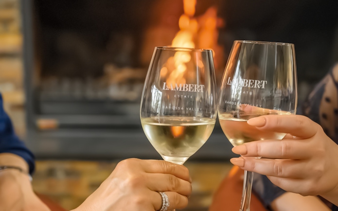 Toasting wine glasses at Lambert Estate, Barossa Valley.