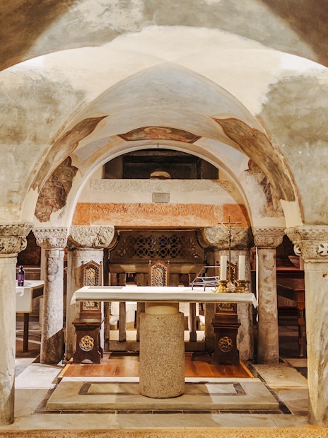 St. Mark's Basilica crypt with ornate columns and altar during exclusive after-hours tour.