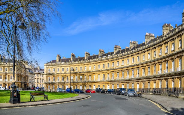 The Circus in Bath, UK, showcasing Georgian architecture with curved townhouses.