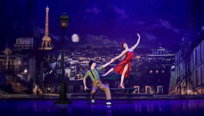 Cabaret dance performers on stage in Paris