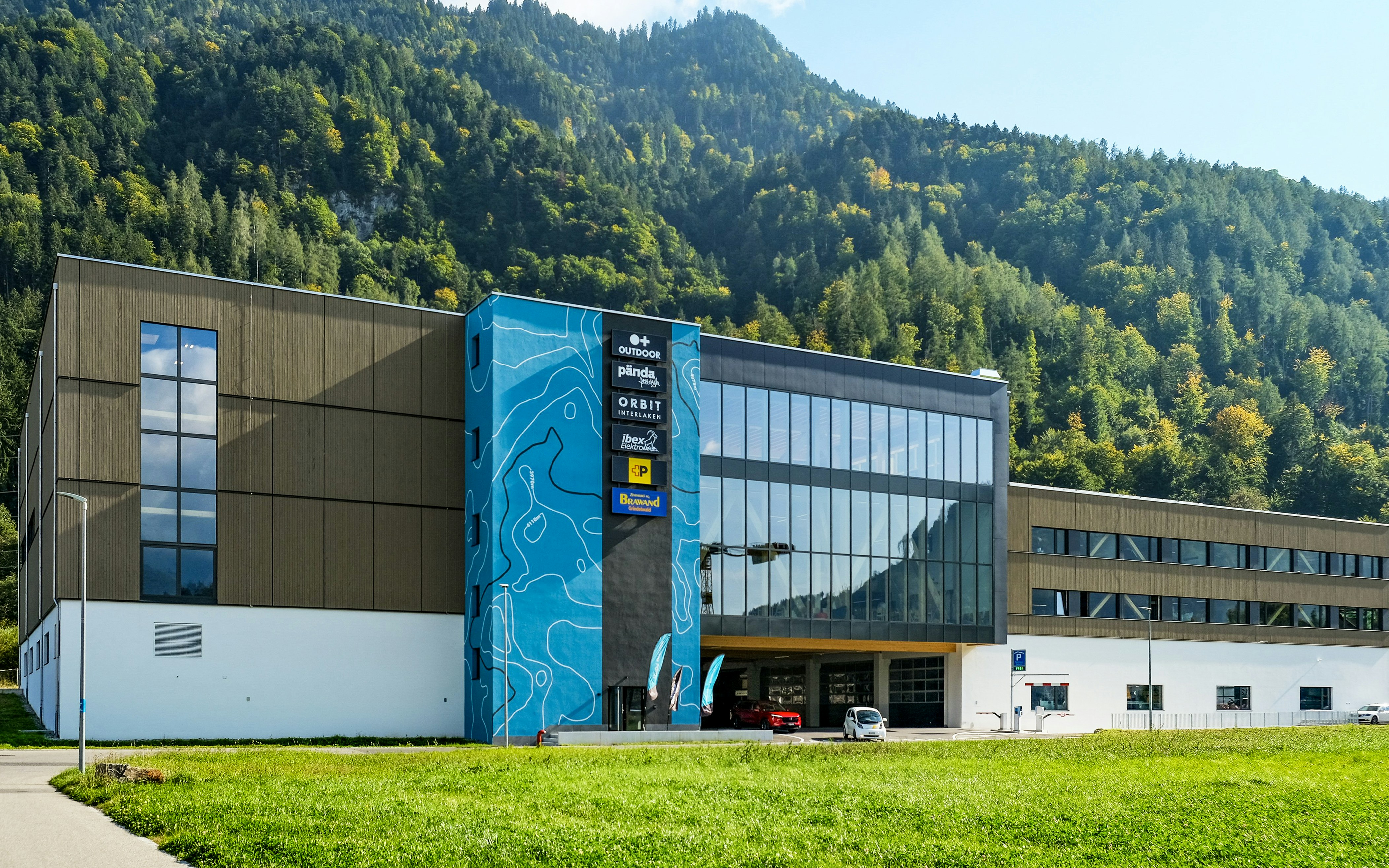 Outdoor Interlaken base building with mountain backdrop in Switzerland.