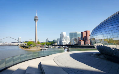Medienhafen Dusseldorf with Rheinturm and modern architecture on city tour.