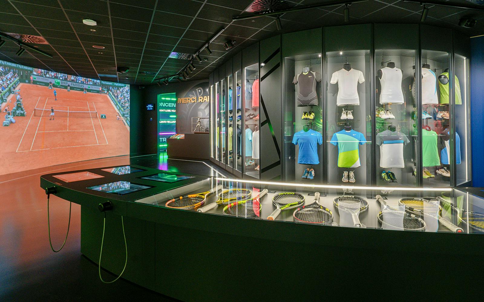 Tennis memorabilia and interactive displays at Rafa Nadal Museum.
