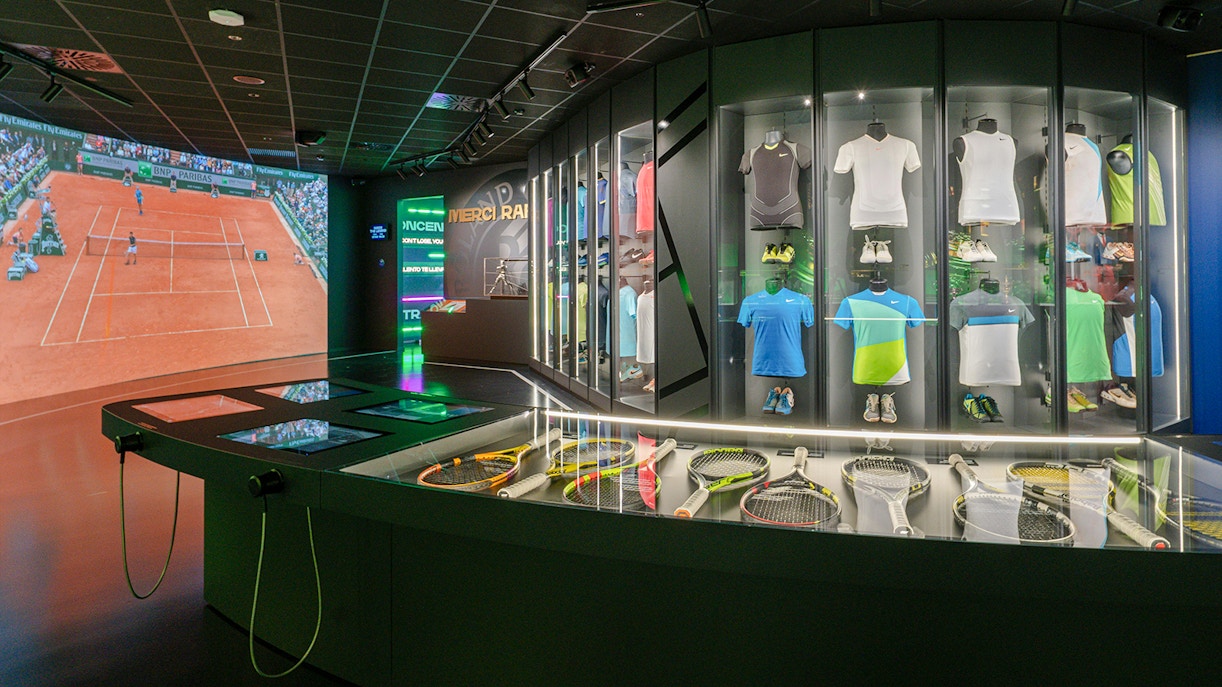 Tennis memorabilia and interactive displays at Rafa Nadal Museum.