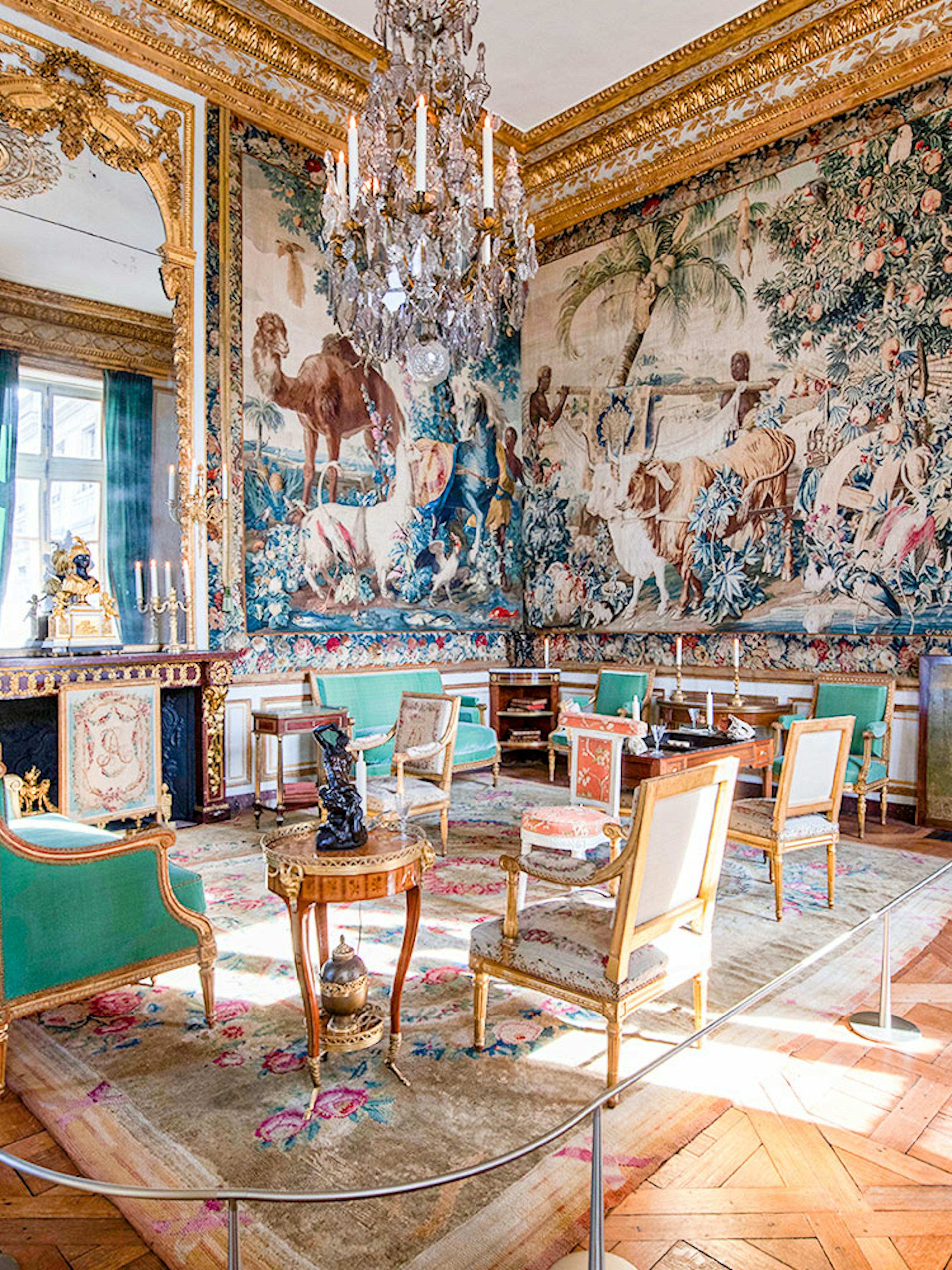 Hôtel de la Marine ornate room with tapestry, chandelier, and antique furniture in Paris.