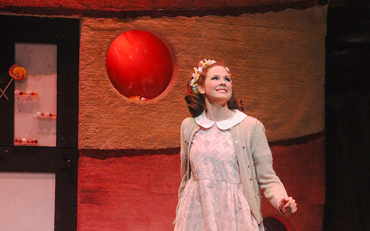 Performer in Hansel and Gretel play on stage in Sydney.