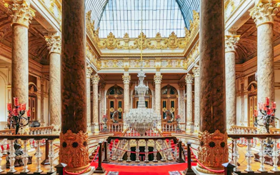 Crystal Staircase in Dolmabahce Palace, Istanbul, with ornate columns and chandelier.