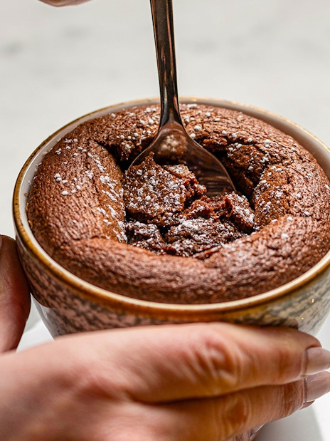 Chocolate soufflé being served at Flora Danica on the Champs Elysées, Paris.