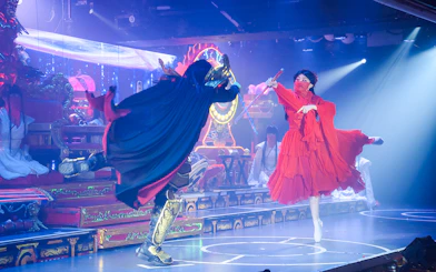 Samurai Restaurant Show sword fight performance with vibrant costumes on stage.