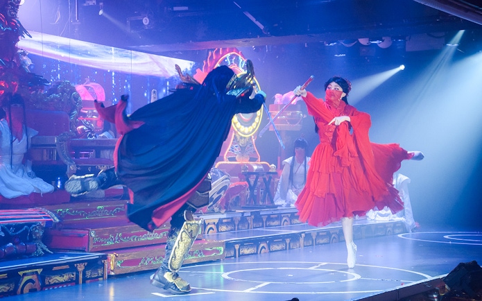 Samurai Restaurant Show sword fight performance with vibrant costumes on stage.