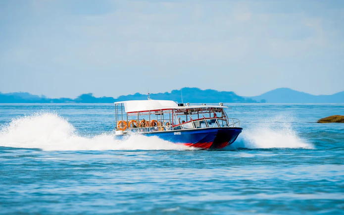 Speedboat Southern Albatross cruising in Singapore waters.