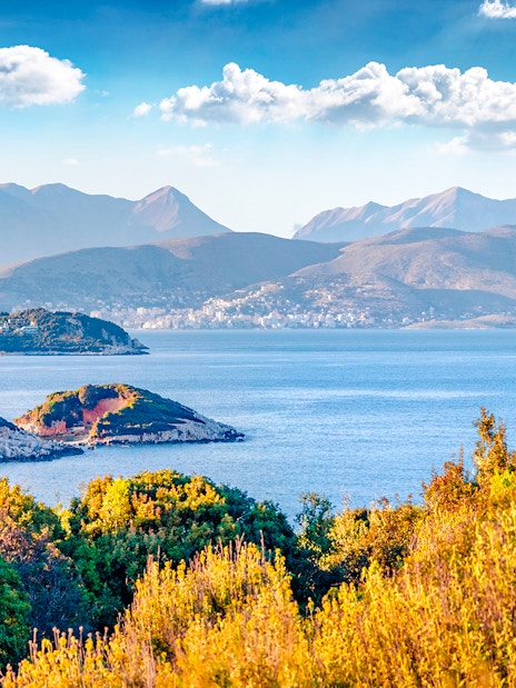 Saranda town summer cityscape with Ionian Sea and distant mountains, Albania.