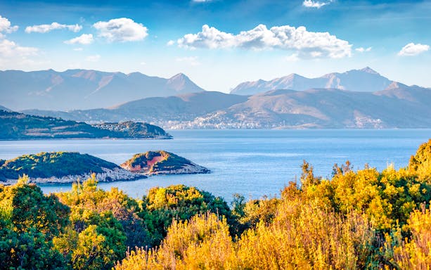 Saranda town summer cityscape with Ionian Sea and distant mountains, Albania.