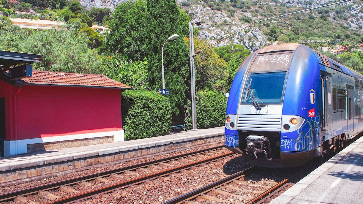 Train arriving at a station near Oceanographic Museum, Monaco.