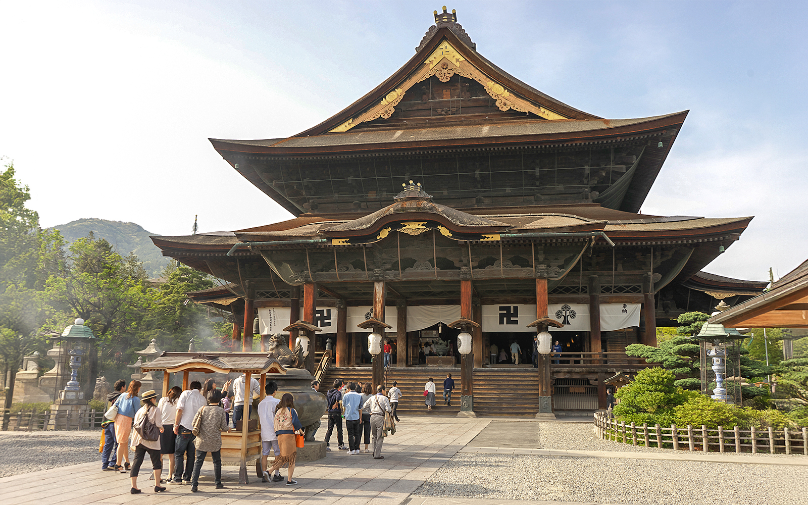 Visitors entering Zenko-ji Temple in Nagano, Japan.
