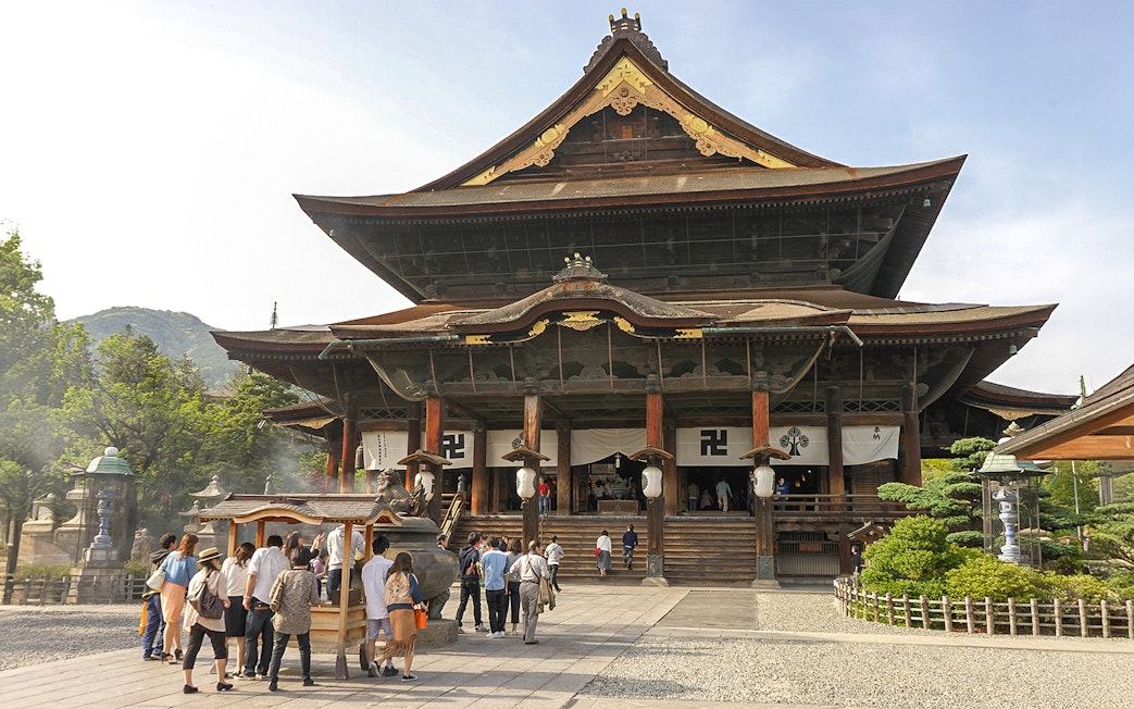 Visitors entering Zenko-ji Temple in Nagano, Japan.