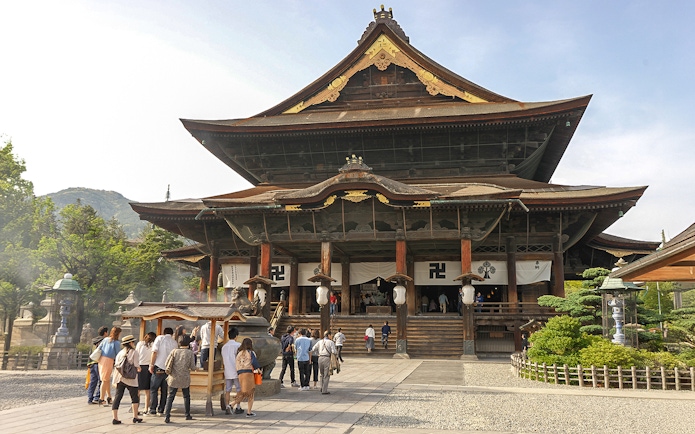 Visitors entering Zenko-ji Temple in Nagano, Japan.