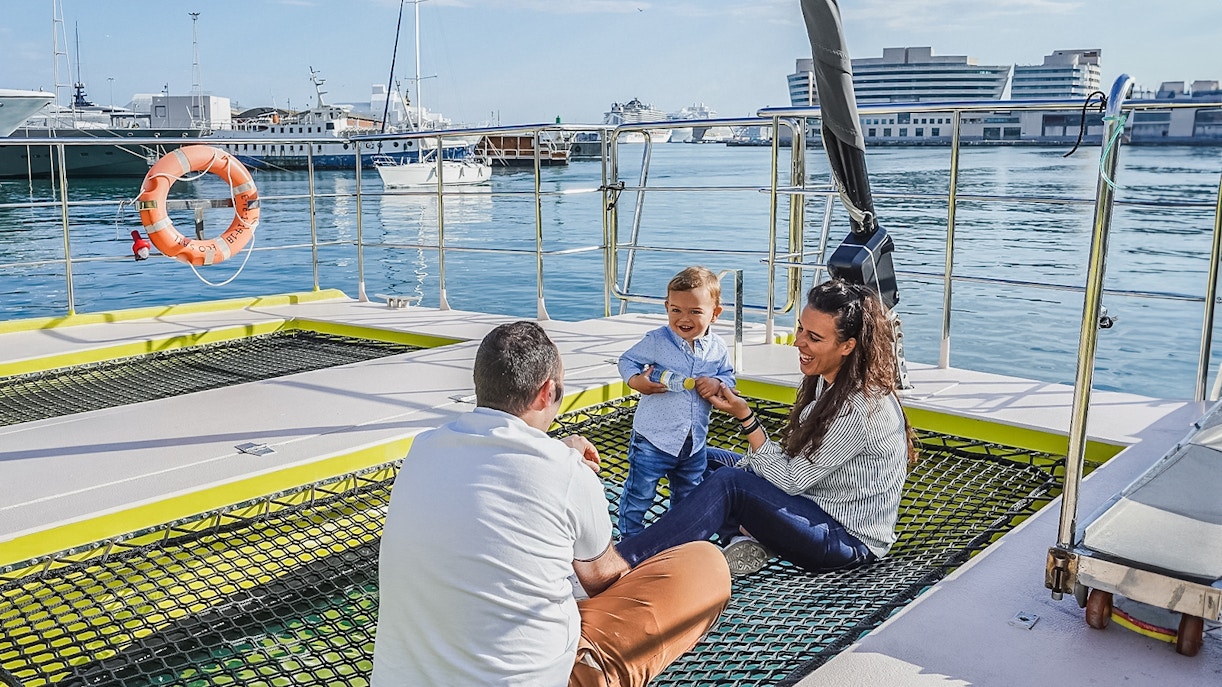 tourists aboard catamaran cruise with kids