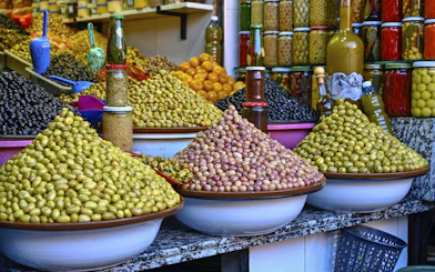 Bowls of olives at a market stall in Fes Medina, Morocco.