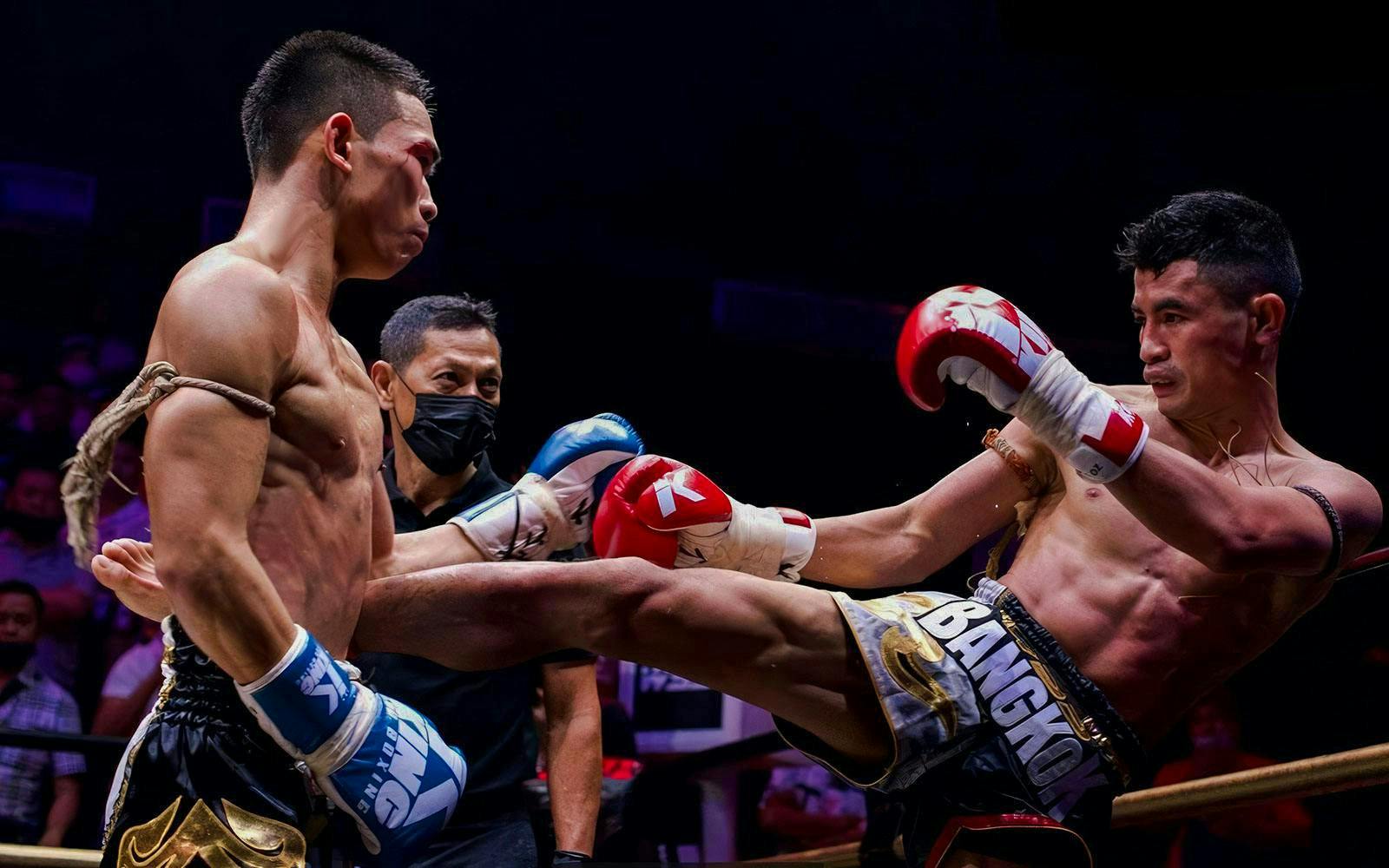 Fighters in a Muay Thai match at World Siam Stadium, Bangkok.