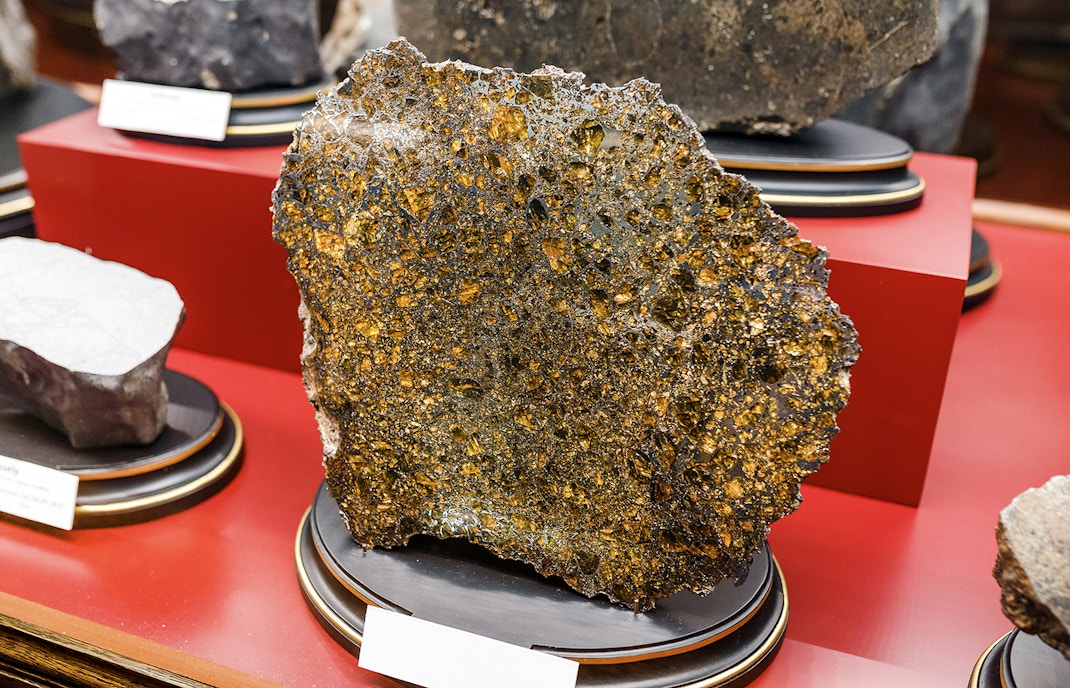 Meteorite specimen displayed in a museum collection.