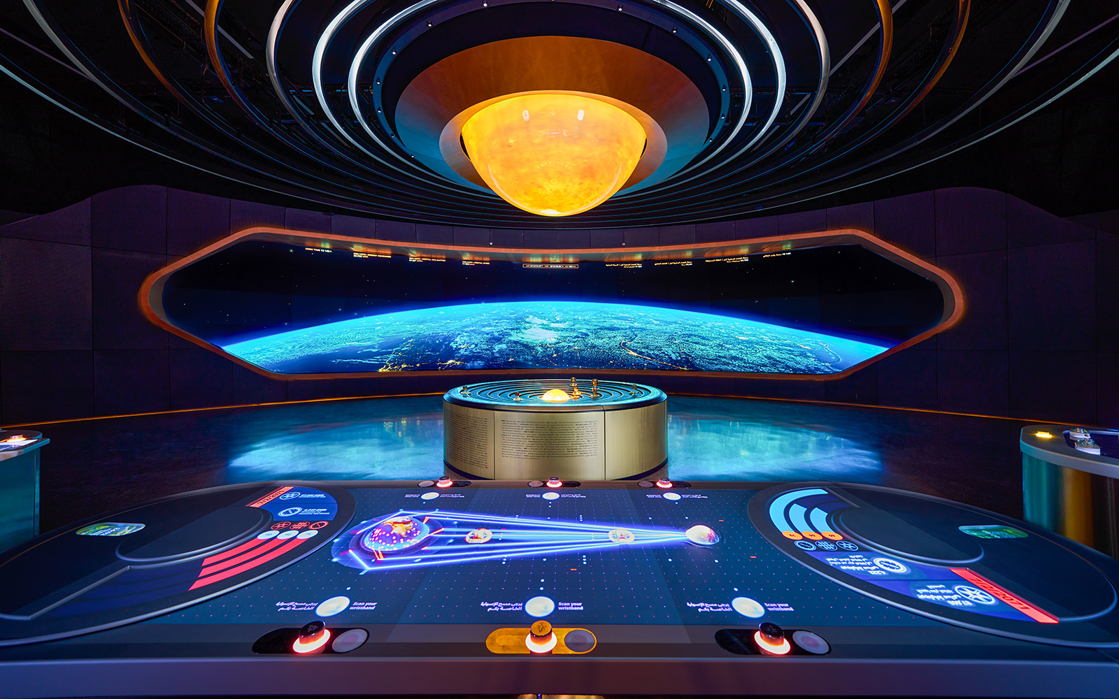 Interactive exhibit at The OSS Hope, Museum of the Future, Dubai, featuring a futuristic control panel and Earth display.