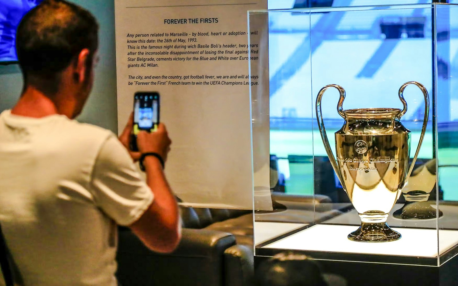 UEFA Champions League trophy on display during Velodrome stadium tour in Marseille.