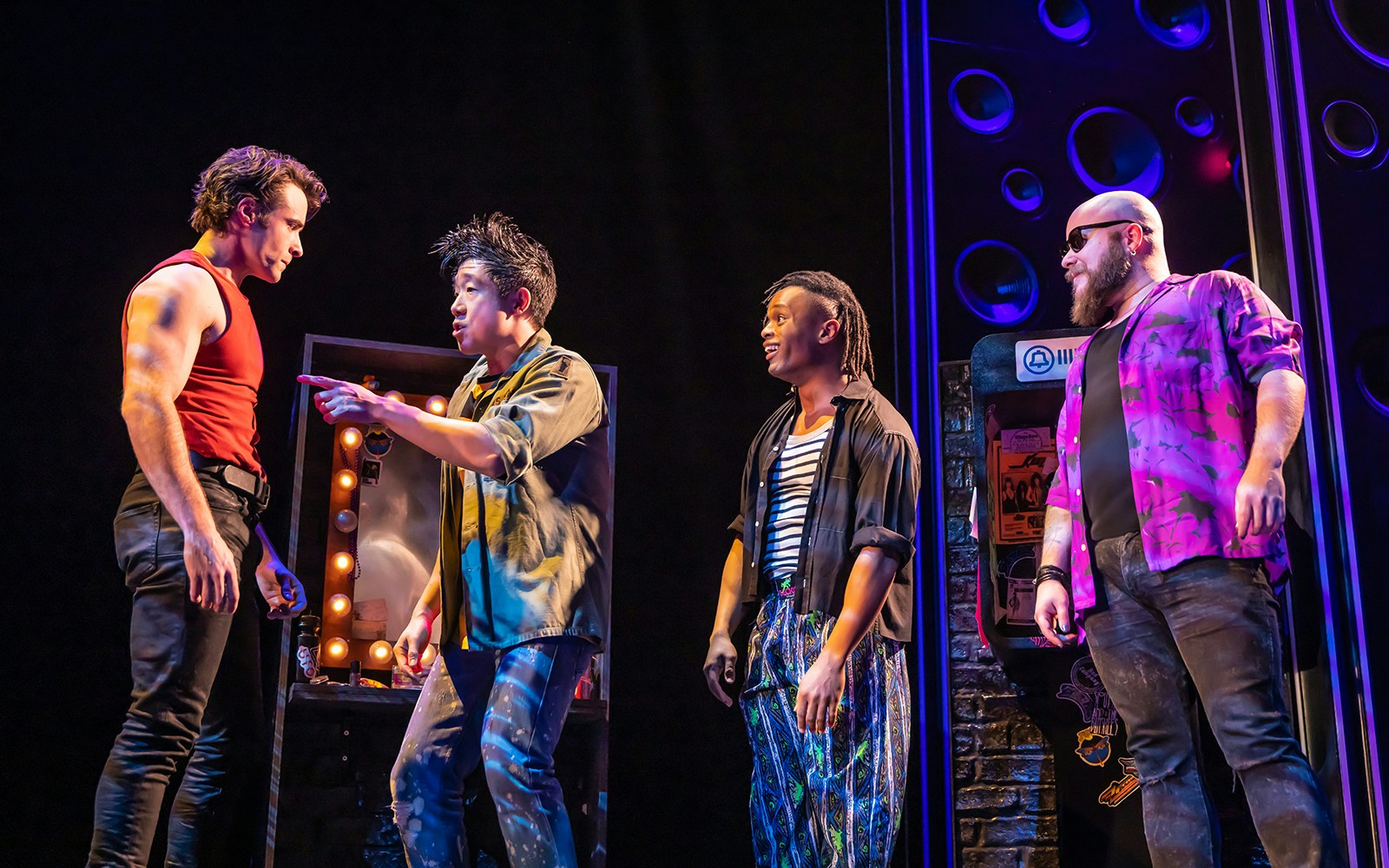 Performers on stage during "The Heart of Rock and Roll" musical.