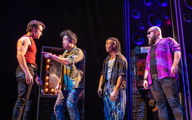 Performers on stage during "The Heart of Rock and Roll" musical.