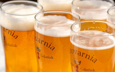 Local beer from Brovarnia Brewery served on Gdańsk Scenic Cruise.