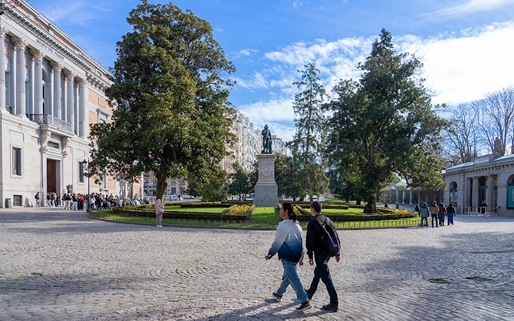 Prado Museum entrance with visitors in line, Madrid, Spain.