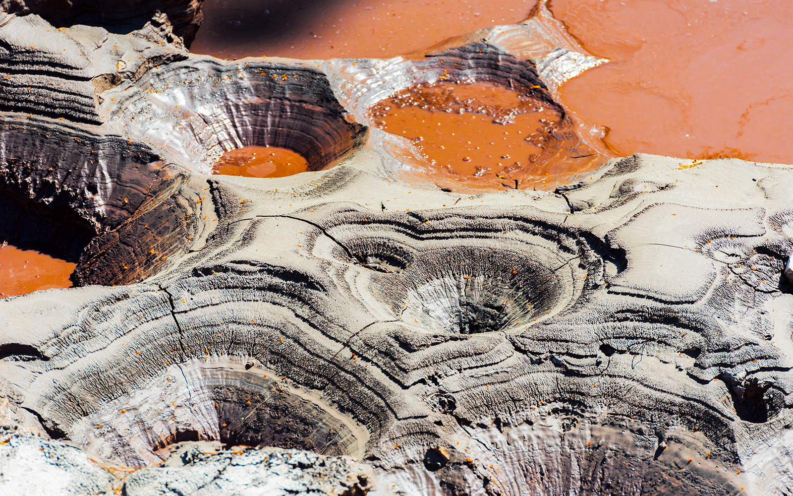 Geothermal craters with colorful mineral deposits at Waiotapu, New Zealand.