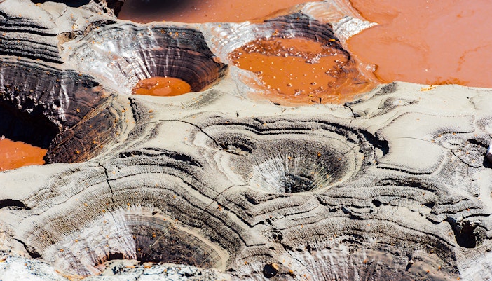 Geothermal craters with colorful mineral deposits at Waiotapu, New Zealand.