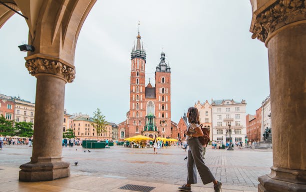 Krakow's St. Mary's Basilica viewed from an archway in the Old Town.