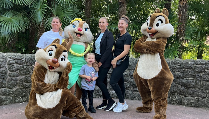 Chip and Dale character greeting visitors at Disneyland Paris.