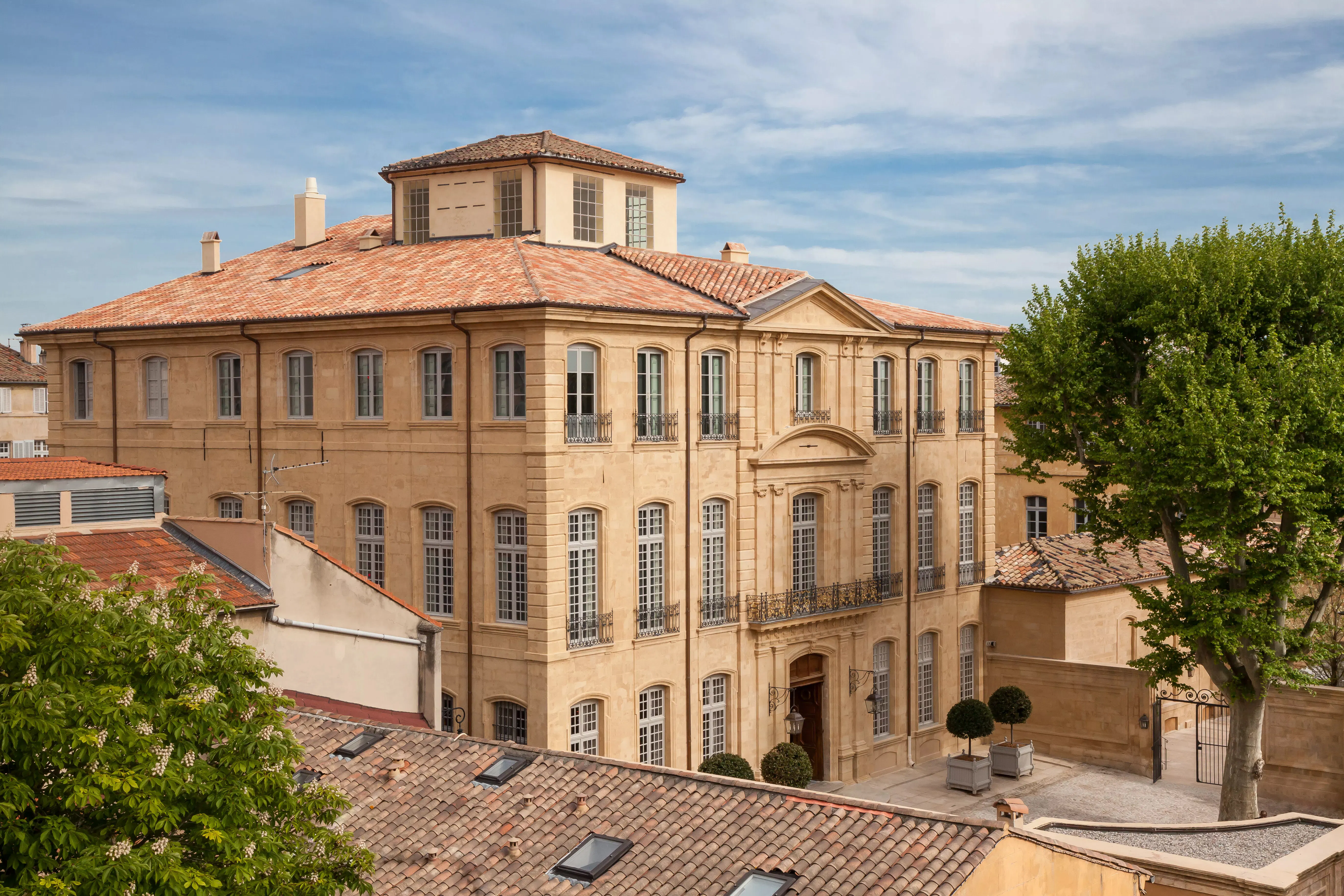 Hotel De Caumont in Aix-en-Provence, France, showcasing its elegant 18th-century architecture.