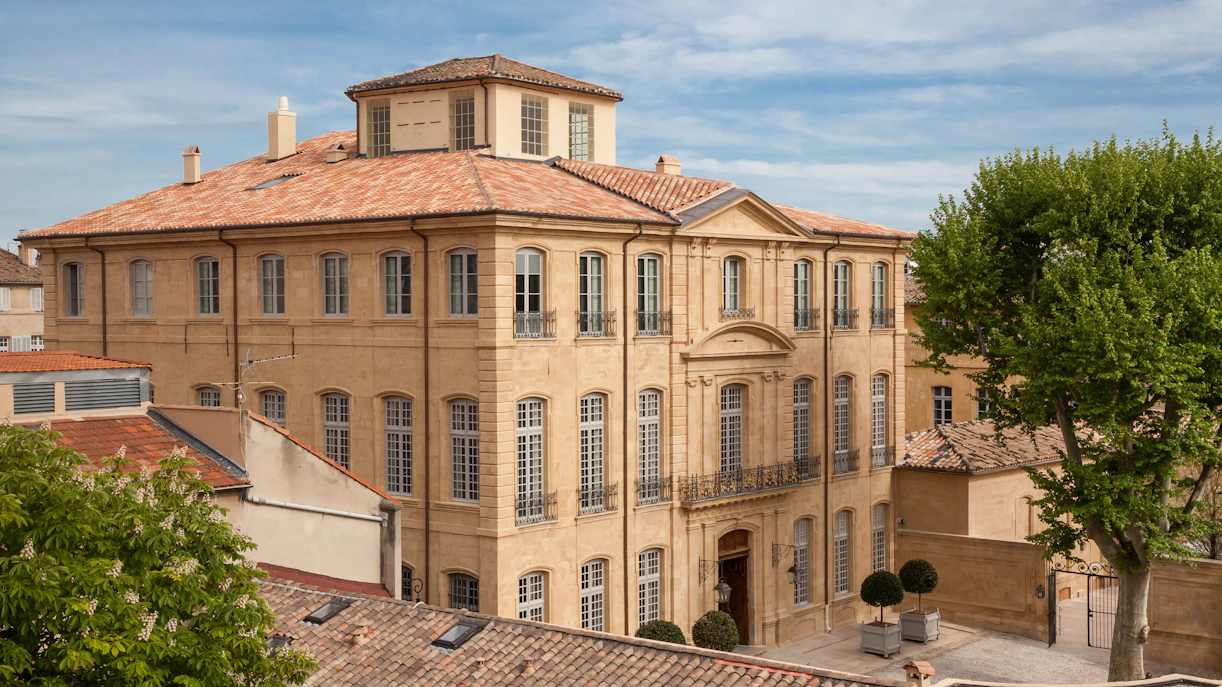 Hotel De Caumont in Aix-en-Provence, France, showcasing its elegant 18th-century architecture.