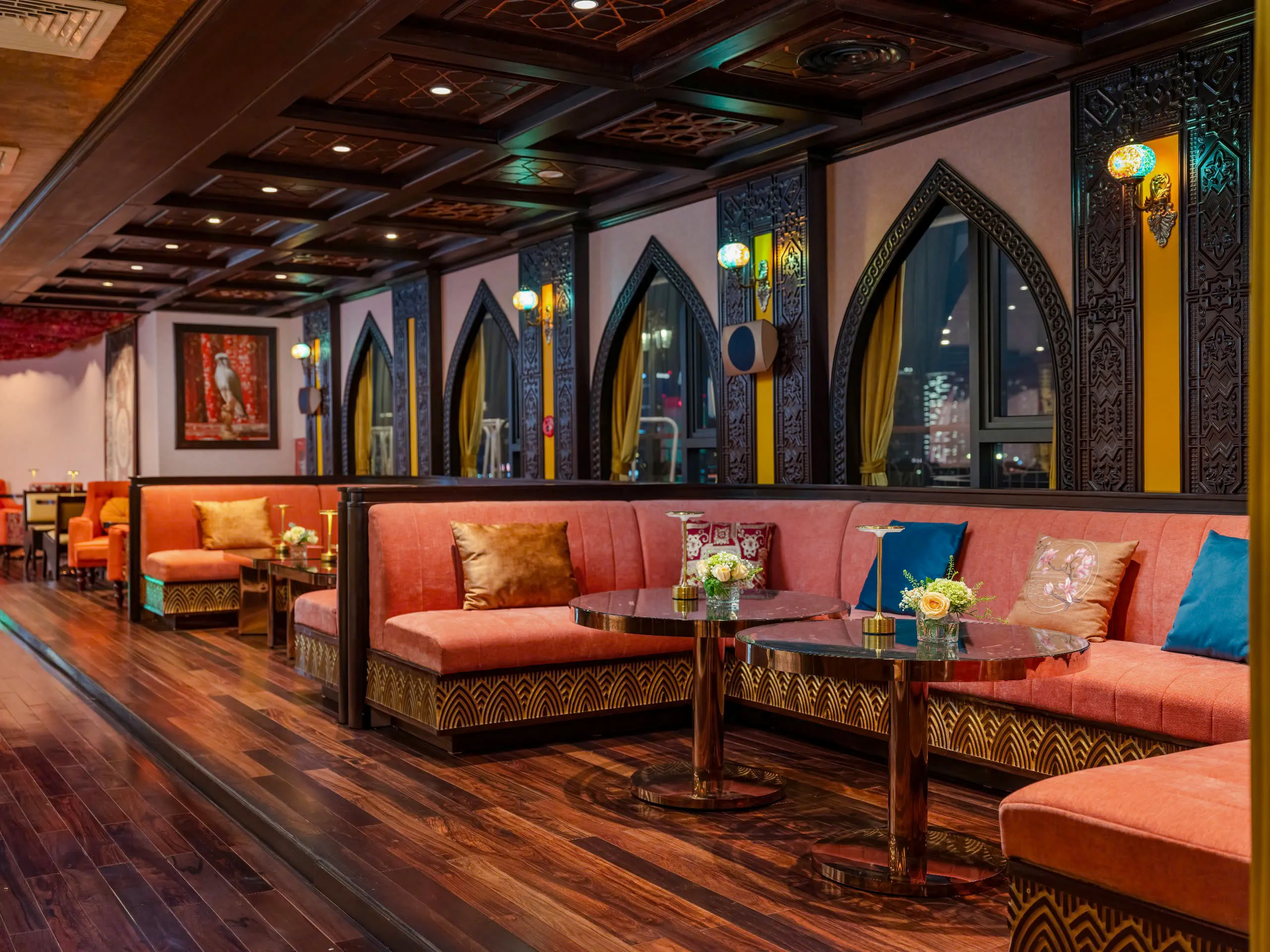 Luxurious interior of a cruise ship lounge with plush seating and ornate decor in Ho Chi Minh City.
