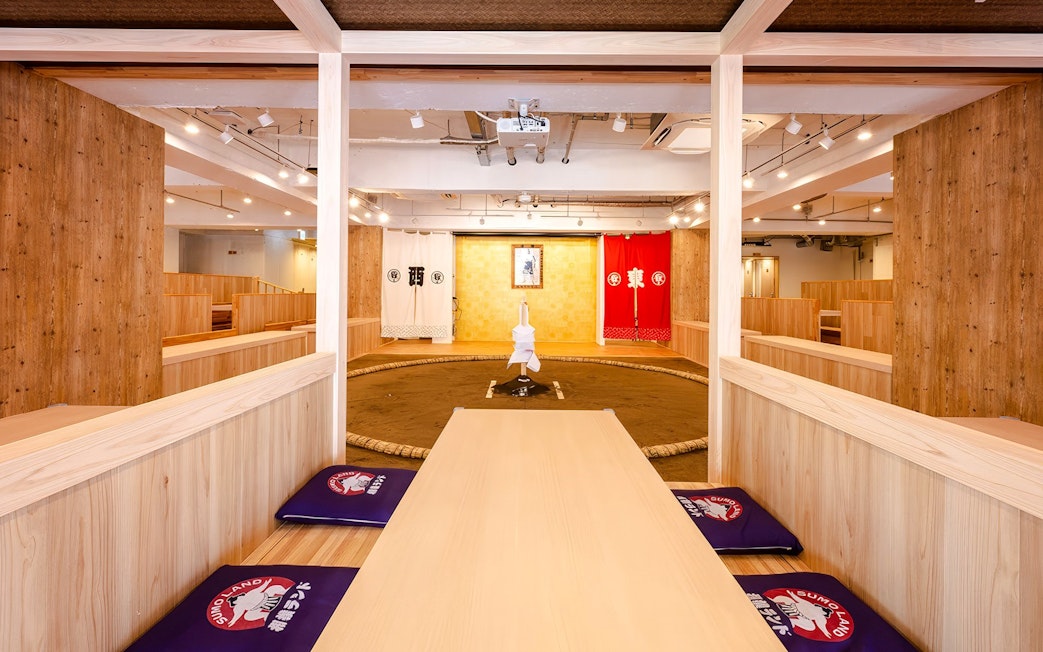 Sumo wrestling arena at Ryogoku with seating and traditional decor.
