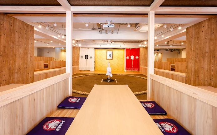 Sumo wrestling arena at Ryogoku with seating and traditional decor.