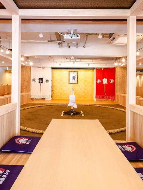 Sumo wrestling arena at Ryogoku with seating and traditional decor.