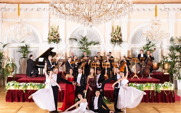 Orchestra and dancers performing at Kursalon Vienna concert hall.