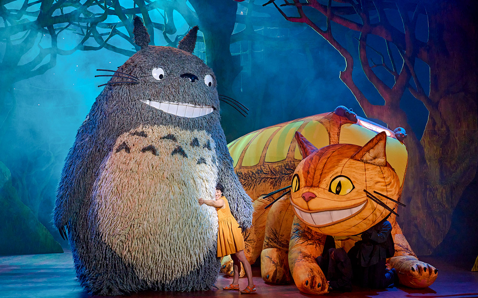 Stage performance of My Neighbour Totoro with Totoro and Catbus characters in West End.