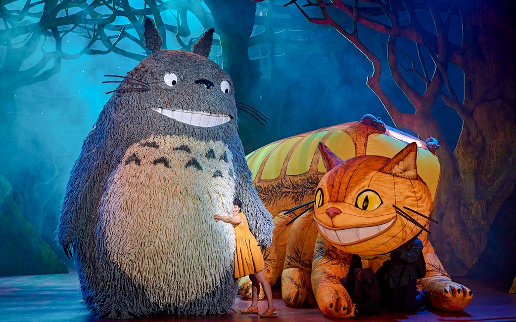Stage performance of My Neighbour Totoro with Totoro and Catbus characters in West End.