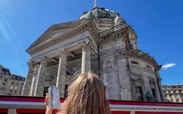 Copenhagen tourist views Marble Church from hop-on hop-off bus.