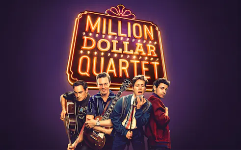 Musicians posing with instruments under "Million Dollar Quartet" sign.